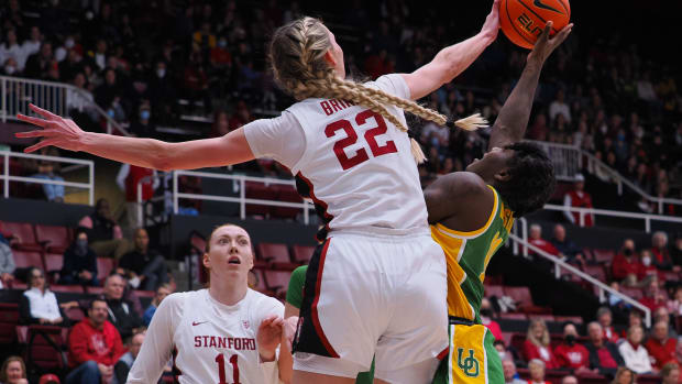 Jan 29, 2023; Stanford, California, USA; Stanford Cardinal forward Cameron Brink (22) blocks the shot by Oregon Ducks forward Taylor Hosendove (11) during the second quarter at Maples Pavilion. Mandatory Credit: Kelley L Cox-USA TODAY Sports
